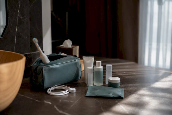 Electric toothbrush partially packed in carry-on suitcase