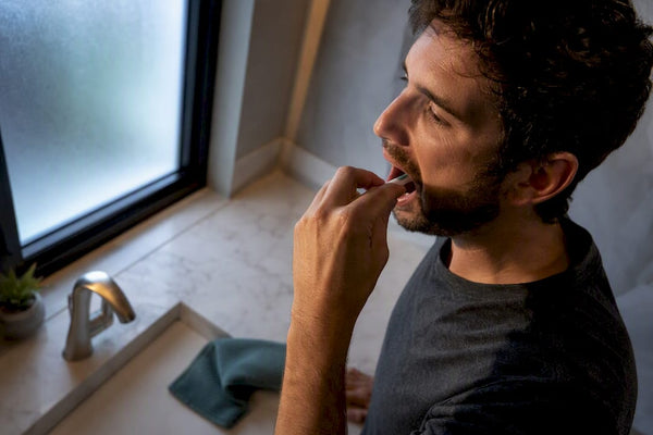 Adult gently brushing with relaxed jaw