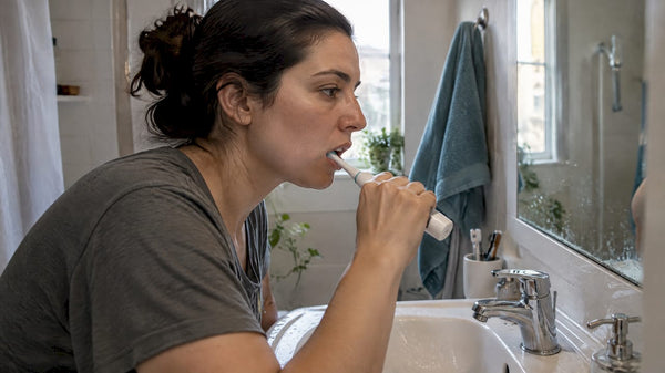Sonic toothbrush splatter landing near bathroom sink
